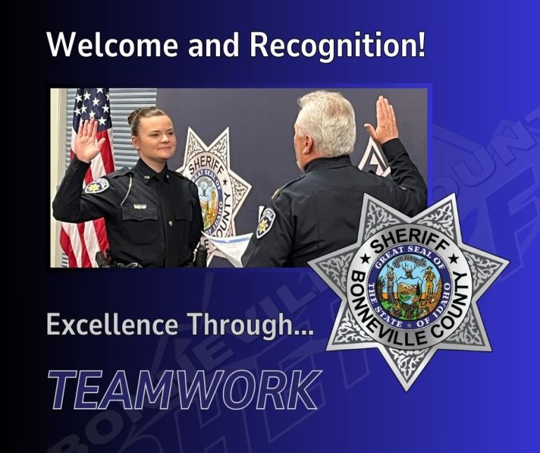 A woman in a Bonneville County Sheriff's uniform raises her right hand during a recognition ceremony, standing across from a man in uniform. Text reads, "Welcome and Recognition! Excellence Through... TEAMWORK.