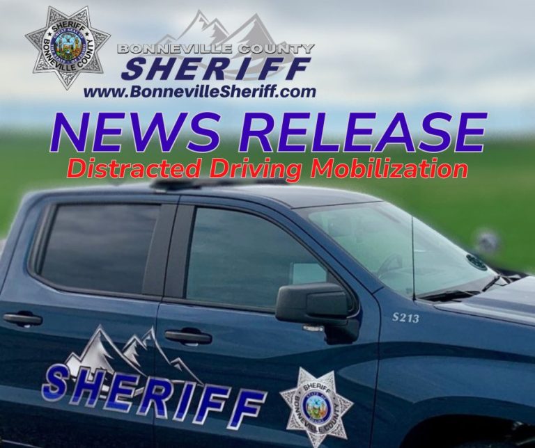 A Bonneville County Sheriff’s vehicle is shown with text overlay: “NEWS RELEASE - Distracted Driving Mobilization.” The sheriff’s badge, website, and “SHERIFF” appear on the image.