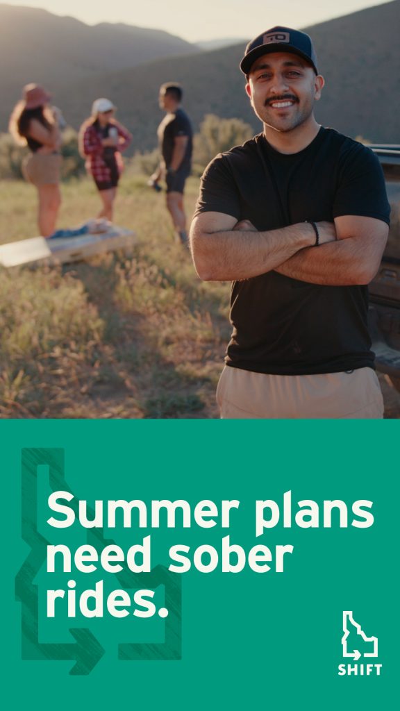 A smiling man stands by a car with his arms crossed, while three people talk in the background outdoors. Text reads: “Summer plans need sober rides.” SHIFT logo is at the bottom.