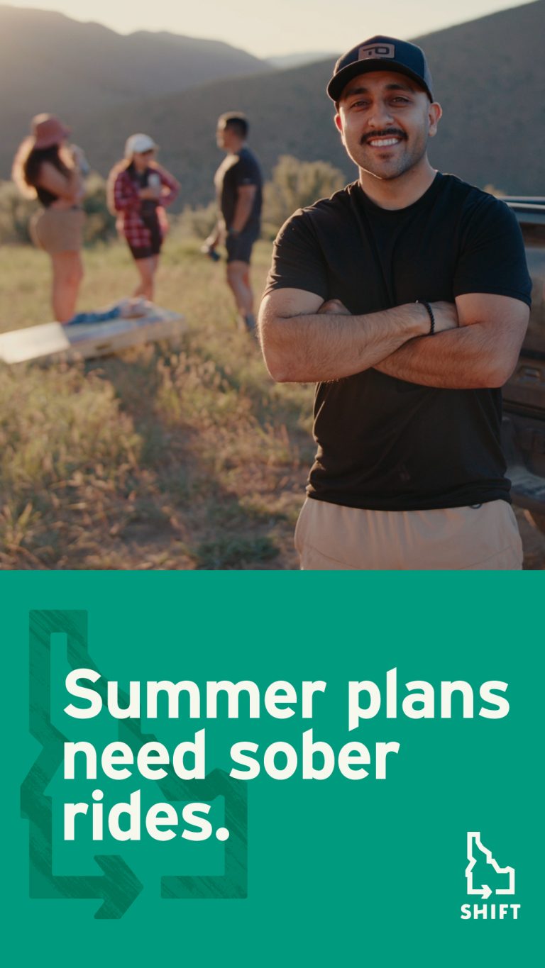A smiling man stands by a car with his arms crossed, while three people talk in the background outdoors. Text reads: “Summer plans need sober rides.” SHIFT logo is at the bottom.