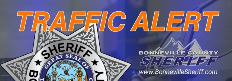 A "TRAFFIC ALERT" notice with the Bonneville County Sheriff’s badge and logo. The text includes the website www.BonnevilleSheriff.com. The background is blue with a faint image of a sheriff's vehicle.
