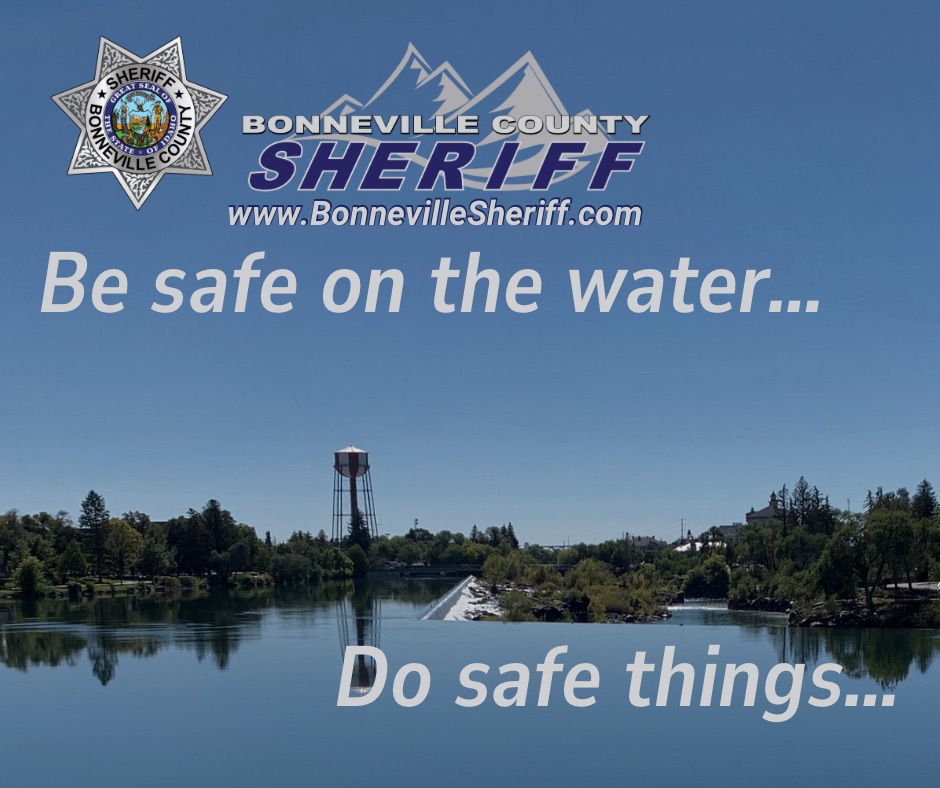 A river scene with trees, a water tower, and a bridge. Text reads: "Bonneville County Sheriff. Be safe on the water... Do safe things..." with the sheriff badge and website at the top.