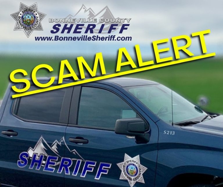 A Bonneville County Sheriff’s vehicle is shown in the foreground with “SCAM ALERT” in bold yellow text across the image. The sheriff's badge and website www.BonnevilleSheriff.com are also displayed.