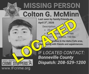 Missing person poster for Colton G. McMinn with a photo of a young man. The word "LOCATED" in large yellow letters is over the poster. Contact info for Bonneville County Dispatch is listed at the bottom.