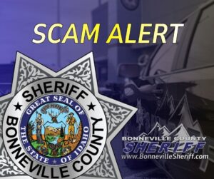 Yellow text reads “Scam Alert” above a Bonneville County Sheriff badge, with a blurred sheriff’s car and the sheriff’s website URL in the background.